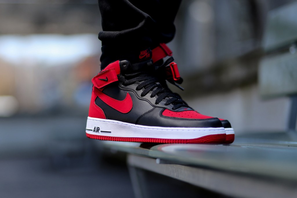 red and black high top air force ones 