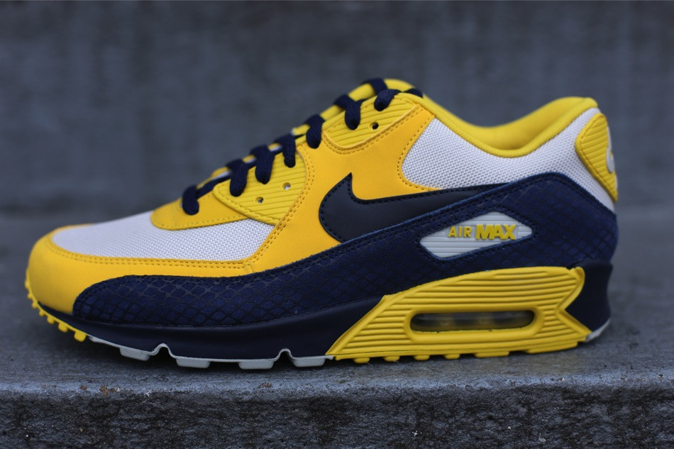 navy blue and yellow air max